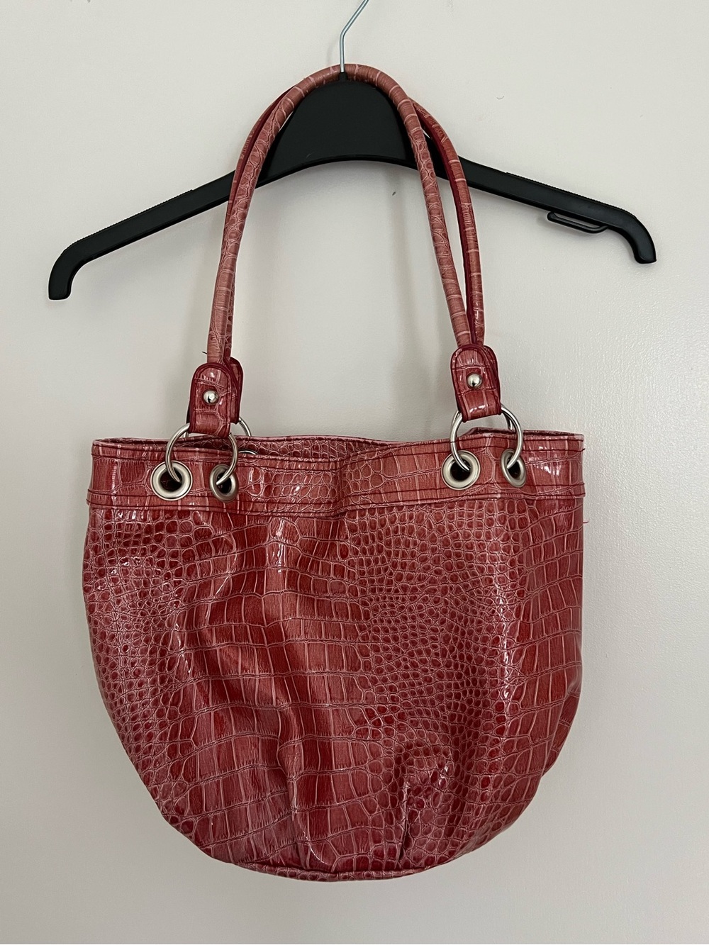 Pinkish/Red crocodile textured leather bag with silver hardware